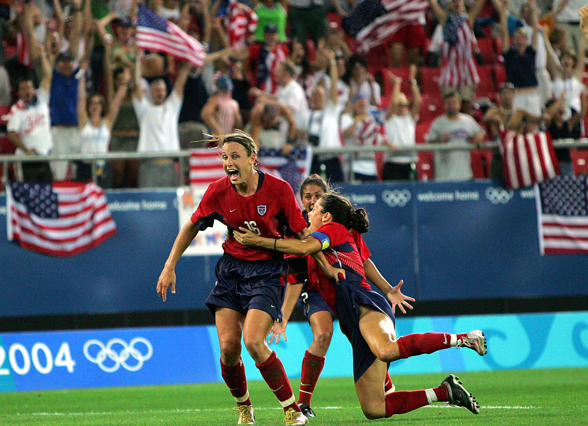 US forward Abby Wambach and her teammate